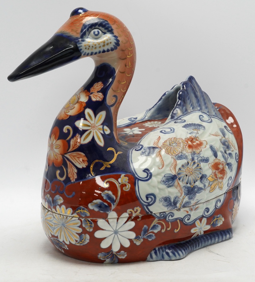 A large porcelain duck box, decorated in the Imari pattern, 40cm wide. Condition - fair